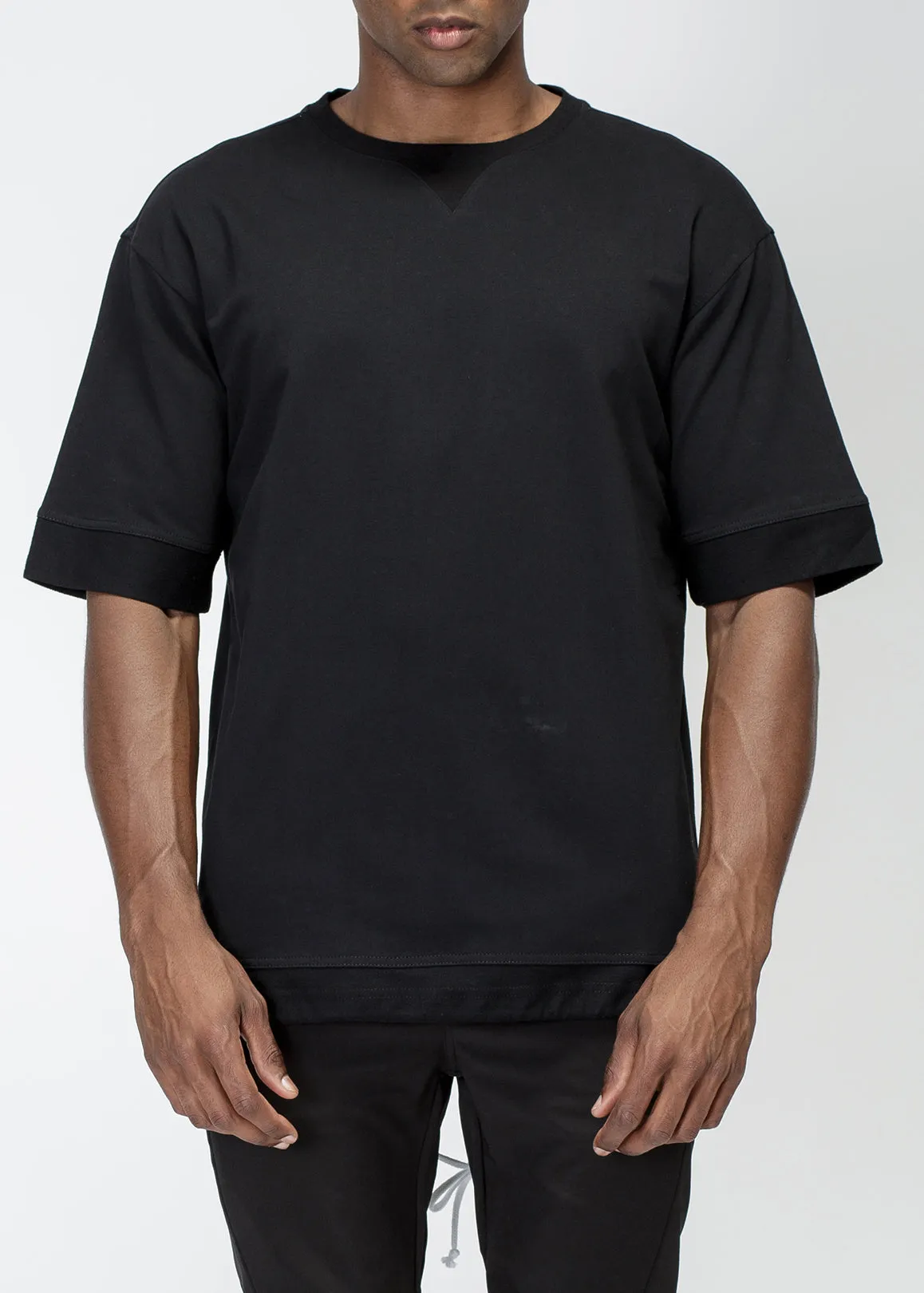 Konus Men's Cut Block Fishtail Tee in Black